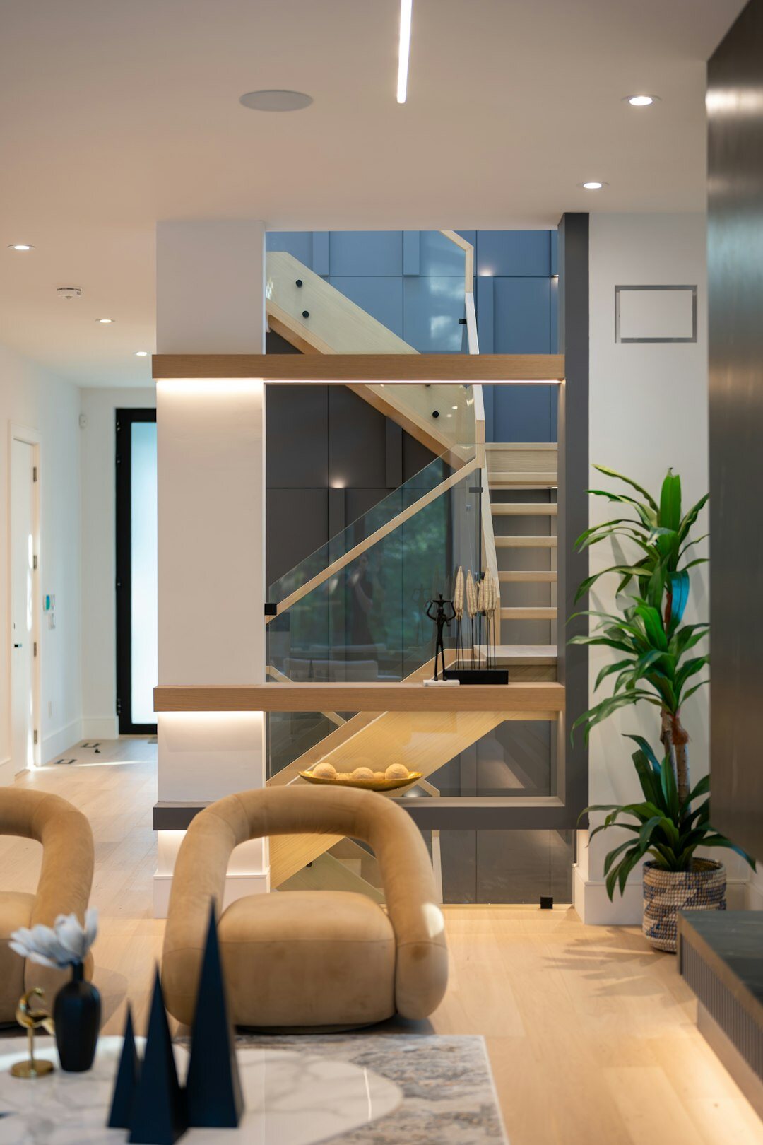 Elegant modern lounge interior with warm lighting and gold accents