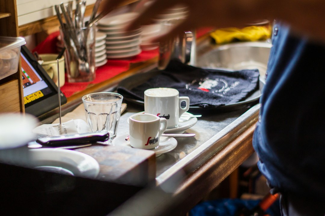 waiter serving coffee