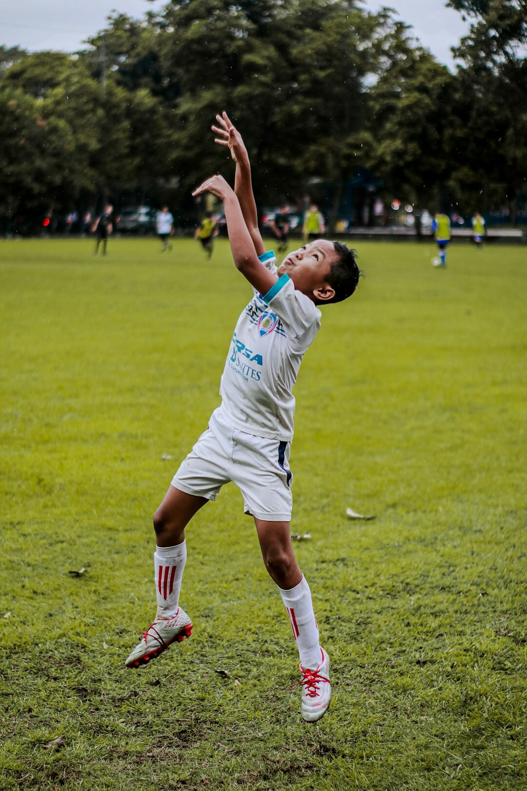 Football player celebrating a goal on the pitch